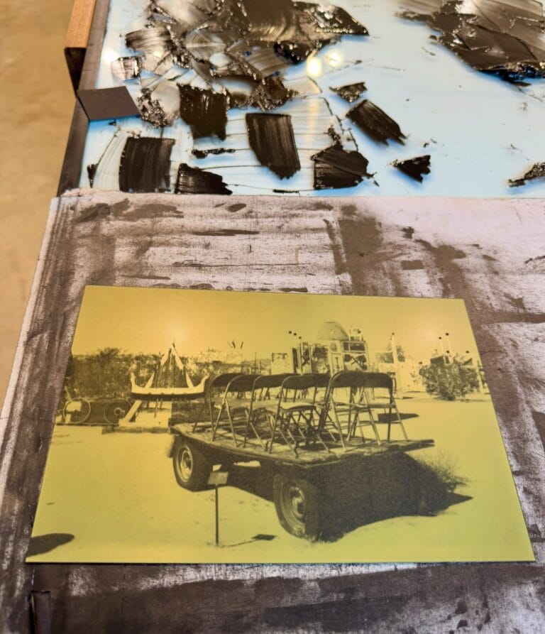 Exposed photopolymer gravure plate beside the photogravure print pulled from it at Prints on Paper Studio